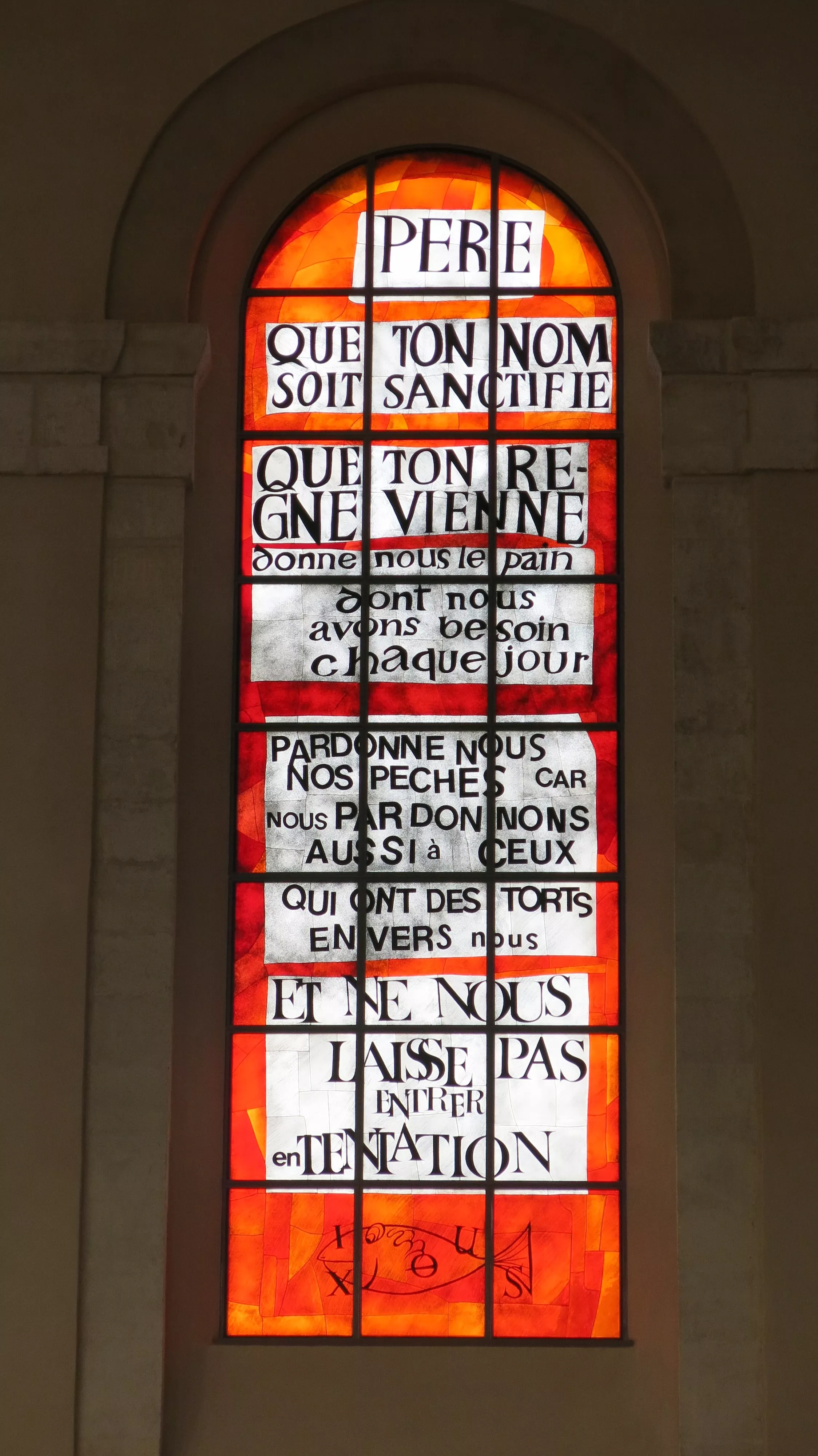 Texte du notre Père sur fond orange