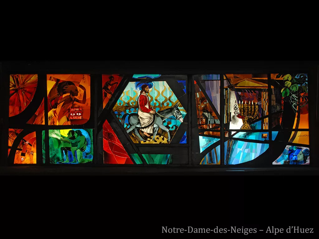 Au centre, Jésus est sur un âne